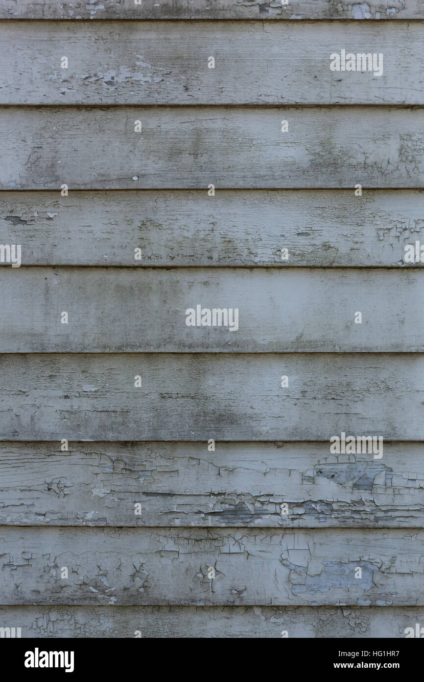 Old, rustic wood siding on an old building, background Stock Photo