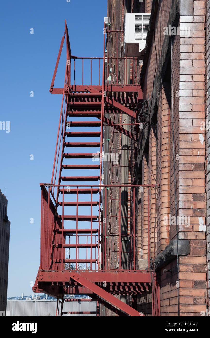 Fire escapes on the exterior of an apartment building in New York City. Stock Photo