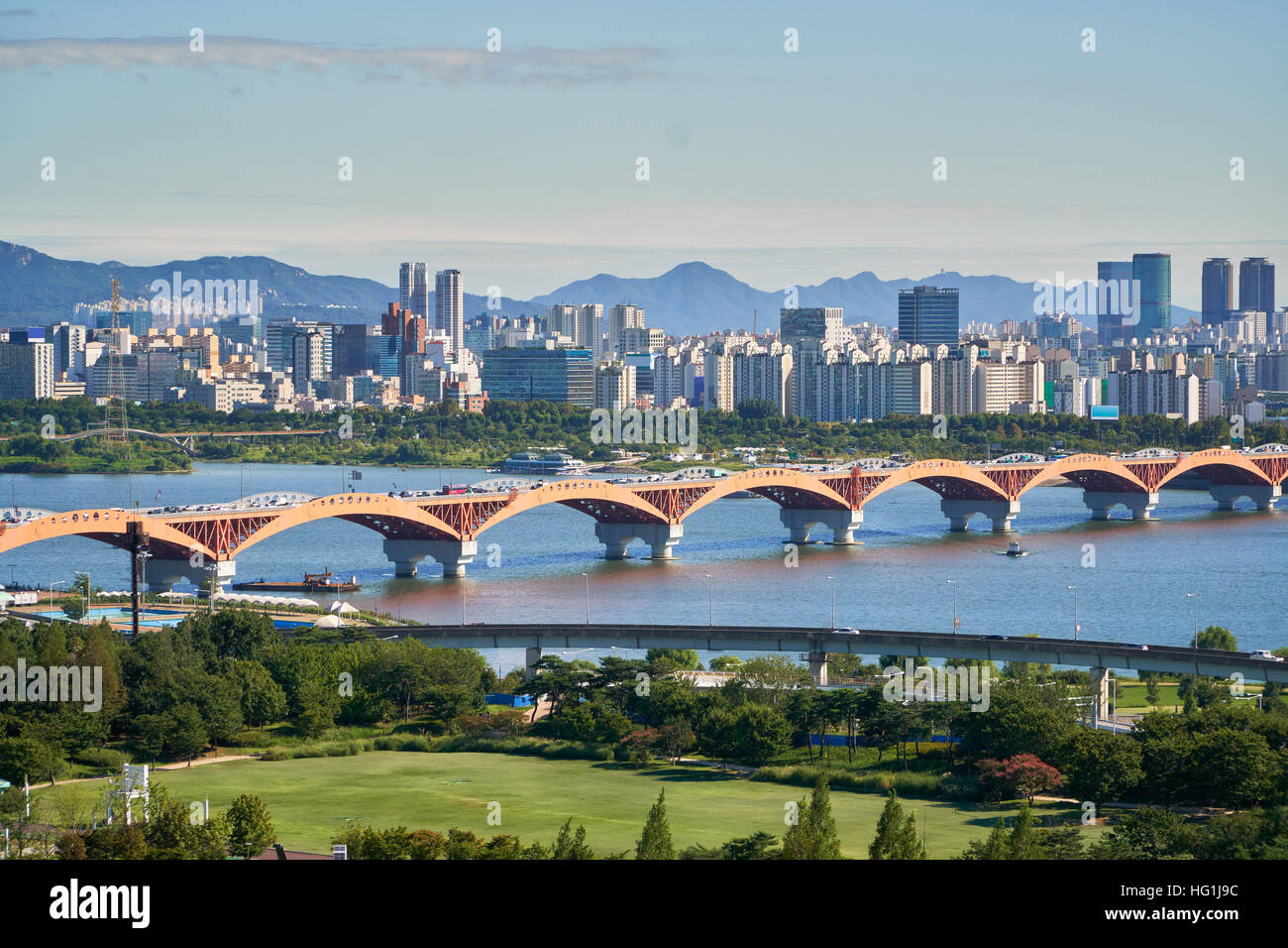 Cityscape of Seoul with Seongsan bridge over Han-river and Buildings in Yeongdeungpo-gu Stock Photo