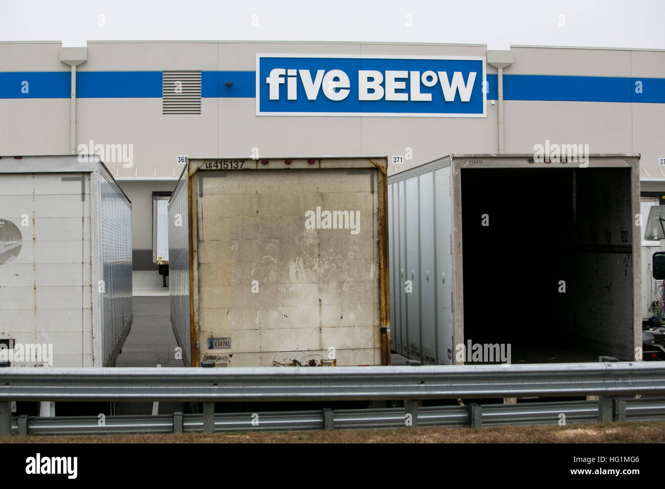 A logo sign outside of a facility occupied by Five Below in Pedricktown, New Jersey on December 11, 2016. Stock Photo