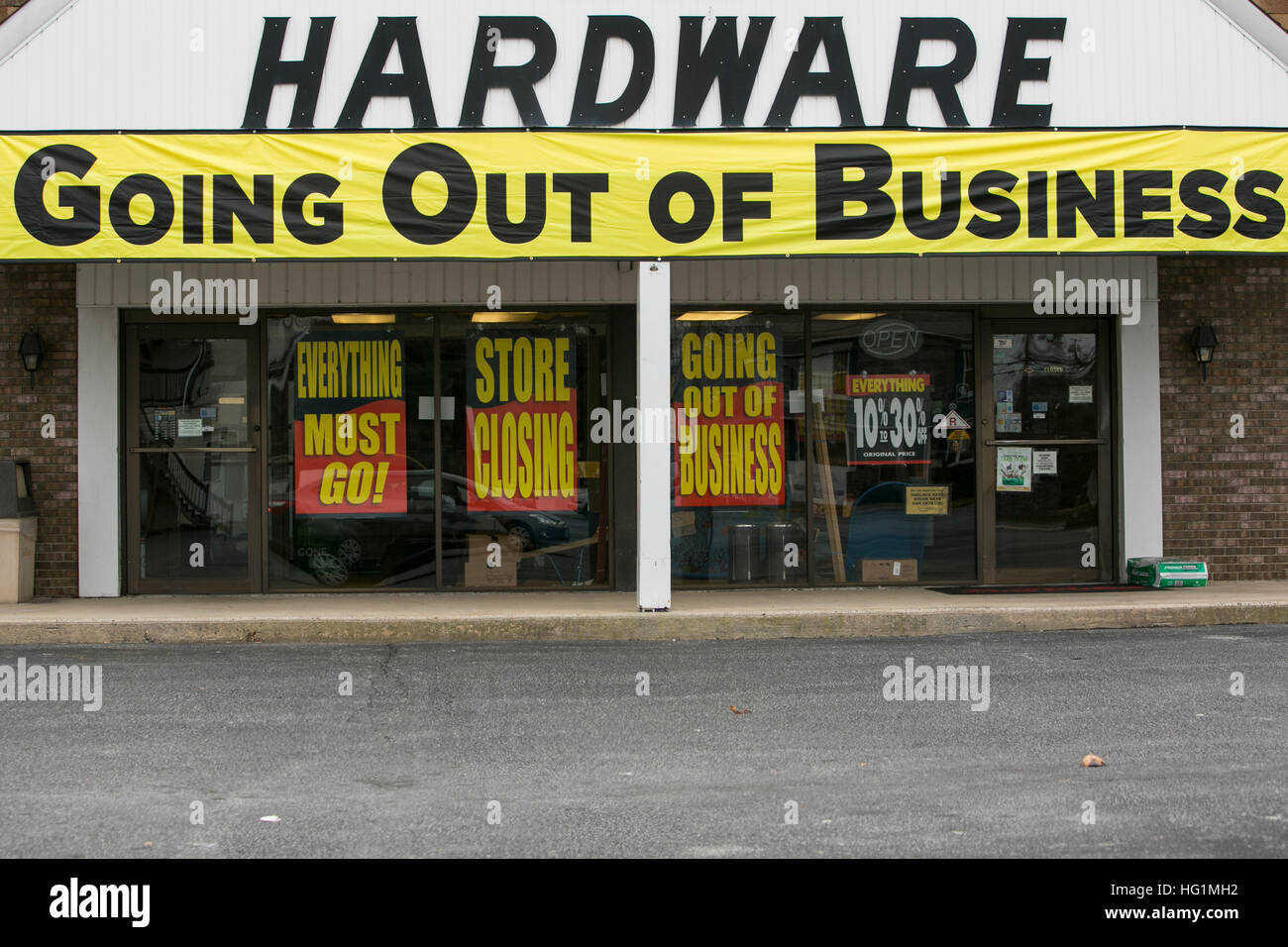 Going Out of Business signs on a True Value hardware retail store in Pennsville, New Jersey on December 11, 2016. Stock Photo