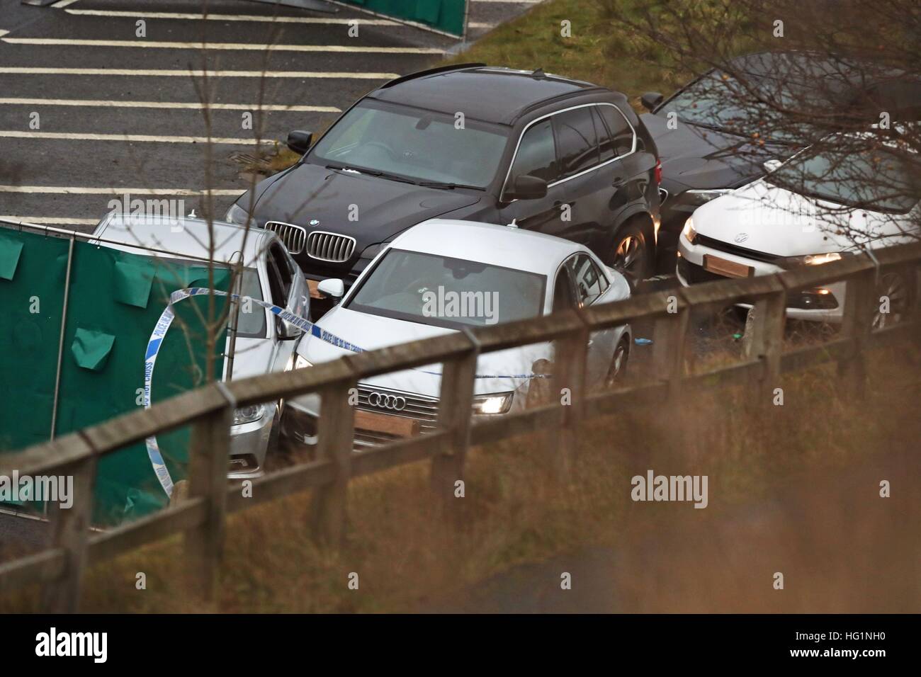 A silver Audi with bullet holes in its windscreen at the scene near junction J24 of the M62 in Huddersfield where a man died in a police shooting during a 'pre-planned' operation at around 6pm on Monday. Stock Photo