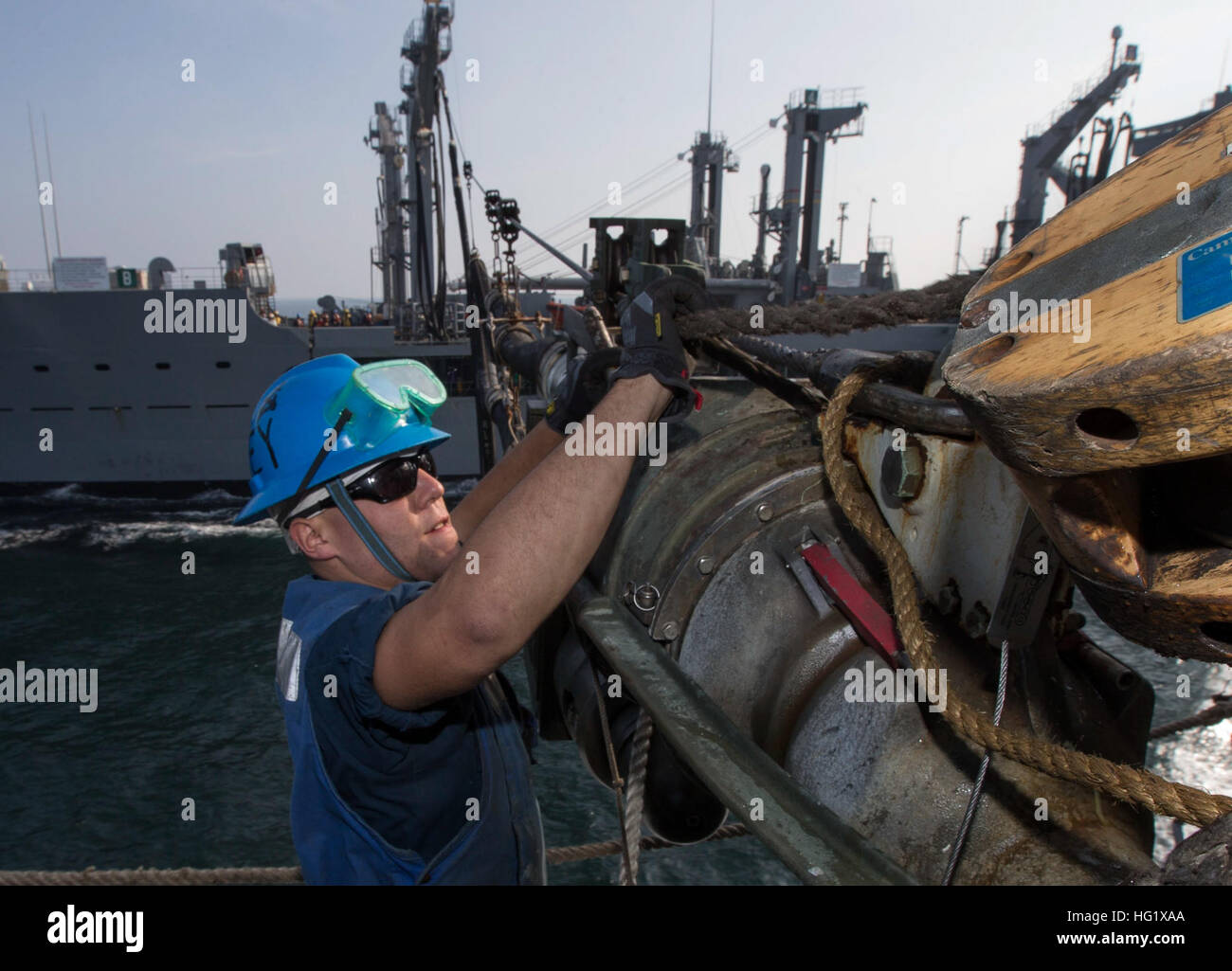 GULF OF OMAN (Jan. 26, 2014) Boatswain’s Mate 3rd Class Craig Drey rigs ...