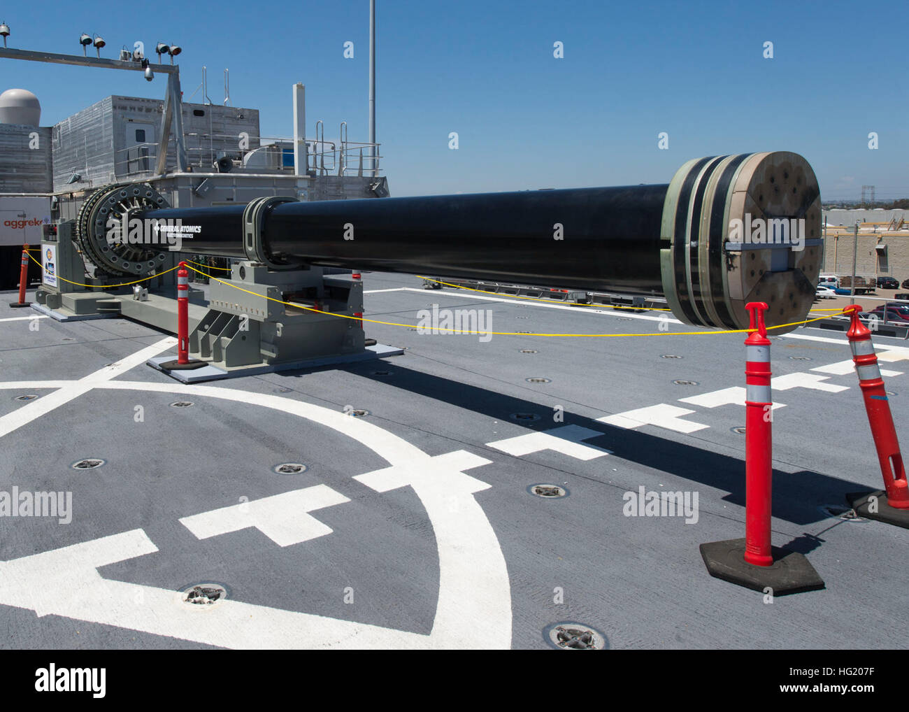 One of two electromagnetic railgun prototypes on display aboard joint high speed vessel USS Millinocket (JHSV 3) in port at Naval Base San Diego. The railguns are being displayed in San Diego as part of the Electromagnetic Launch Symposium, which brought together representatives from the U.S. and allied navies, industry and academia to discuss directed energy technologies. (U.S. Navy photo by Mass Communication Specialist 2nd Class Kristopher Kirsop/Released) USS Millinocket operations 140708-N-ZK869-003 Stock Photo