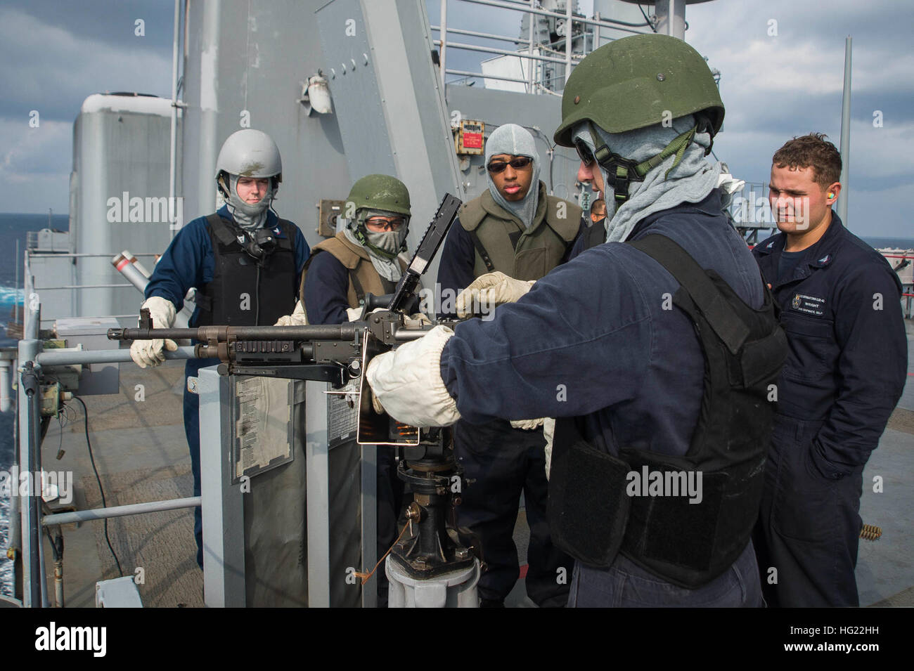 M240b Loading Gunner’s Mate demonstrates loading an M240B machine gun during a live ...