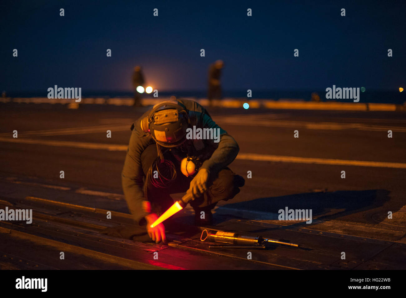 Aviation Boatswain’s Mate (Equipment) 3rd Class Glen Banilar conducts operational checks on a