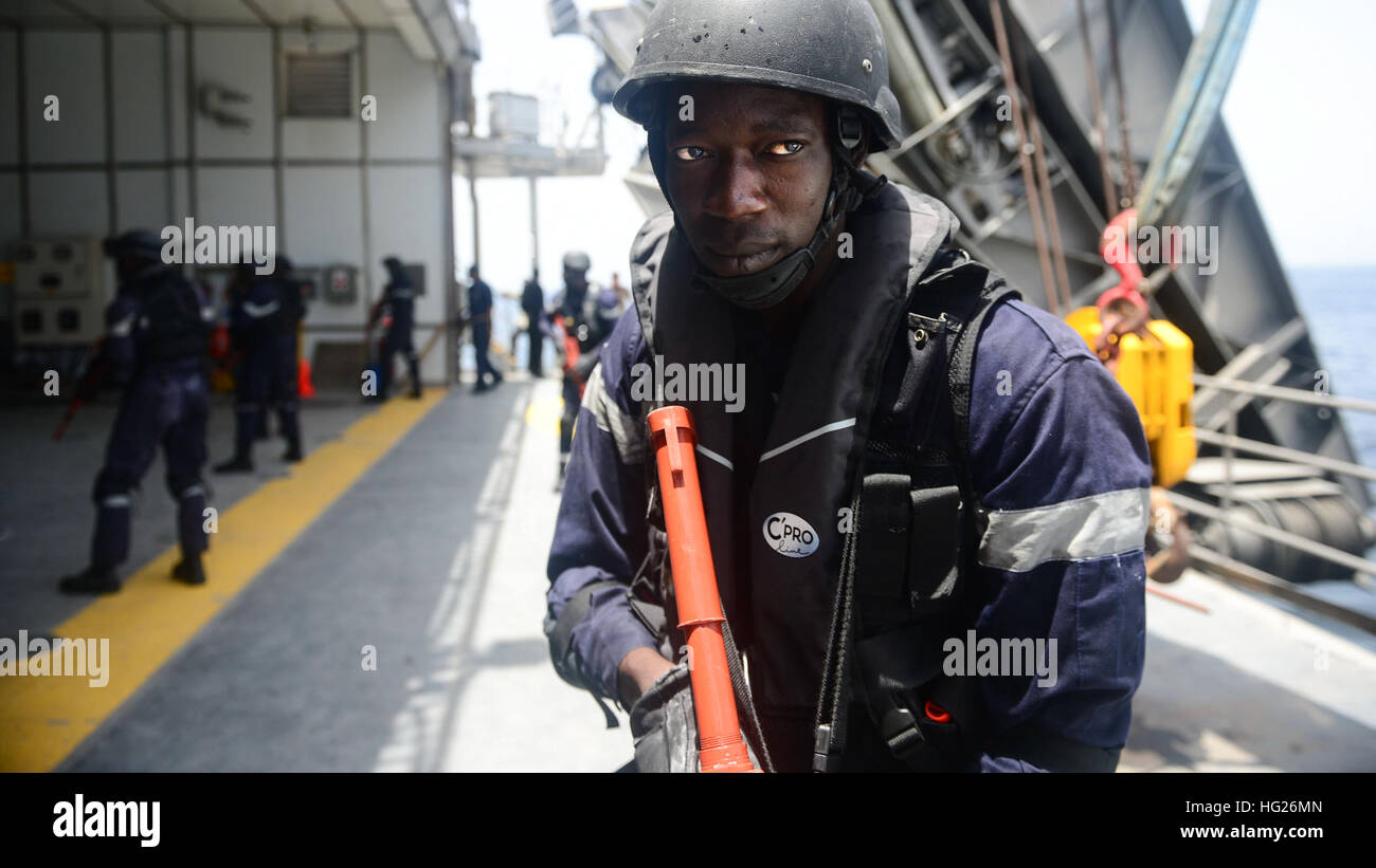 150425-N-RB579-003 ATLANTIC OCEAN (April 25, 2015) A member of the Senegalese military conducts visit, board, search and seizure training aboard the Military Sealift Command's joint high-speed vessel USNS Spearhead (JHSV 1) in support of Exercise Saharan Express 2015, April 25. Saharan Express is a U.S. Africa Command-sponsored multinational maritime exercise designed to increase maritime safety and security in the waters of West Africa. (U.S. Navy photo by Mass Communication Specialist 1st Class Joshua Davies/Released) USNS Spearhead (JHSV-1) 150425-N-RB579-003 Stock Photo
