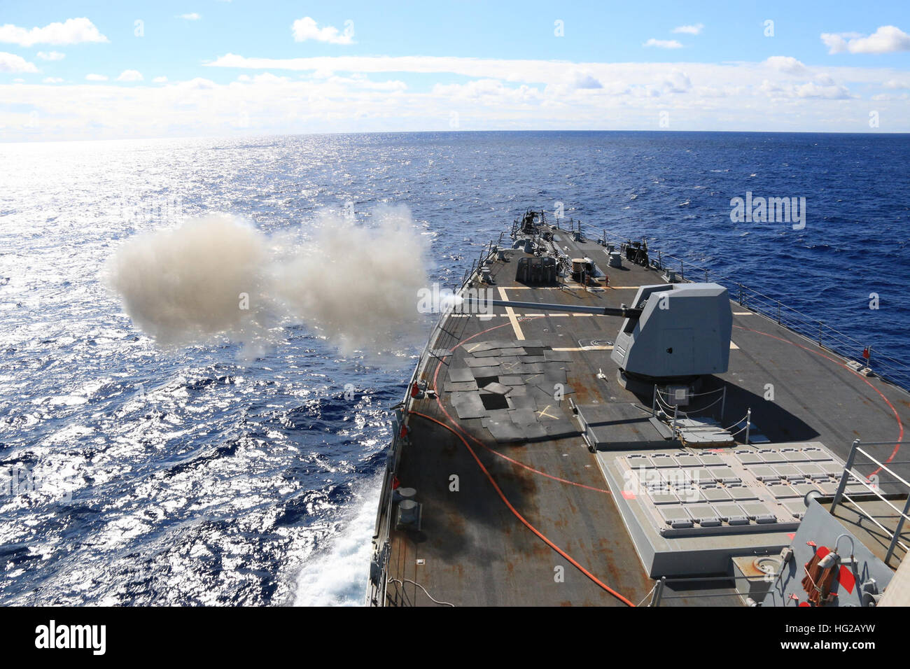 PHILIPPINE SEA (Jan. 17, 2016) The Arleigh Burke-class guided missile destroyer USS McCampbell (DDG 85) fires a MK 45 5-inch gun during a live-fire exercise. McCampbell is on patrol in the 7th Fleet area of operation in support of security and stability in the Indo-Asia-Pacific region. (U.S. Navy photo by ENS Soon Kwon, USN/Released)160117-N-JU970-863 Join the conversation: http://www.navy.mil/viewGallery.asp http://www.facebook.com/USNavy http://www.twitter.com/USNavy http://navylive.dodlive.mil http://pinterest.com https://plus.google.com USS McCampbell conducts a live-fire exercise. (238731 Stock Photo