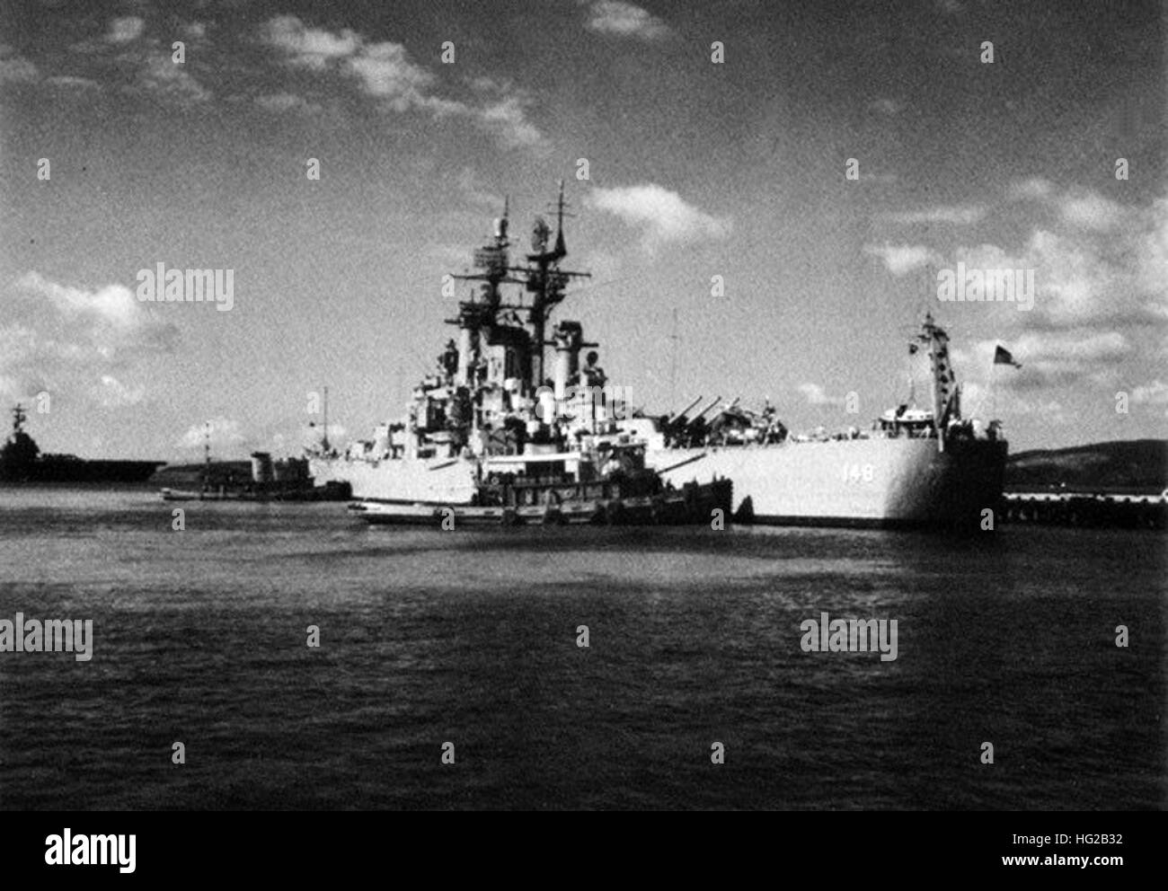 USS Newport News (CA-148) docks at Naval Station Roosevelt Roads in ...