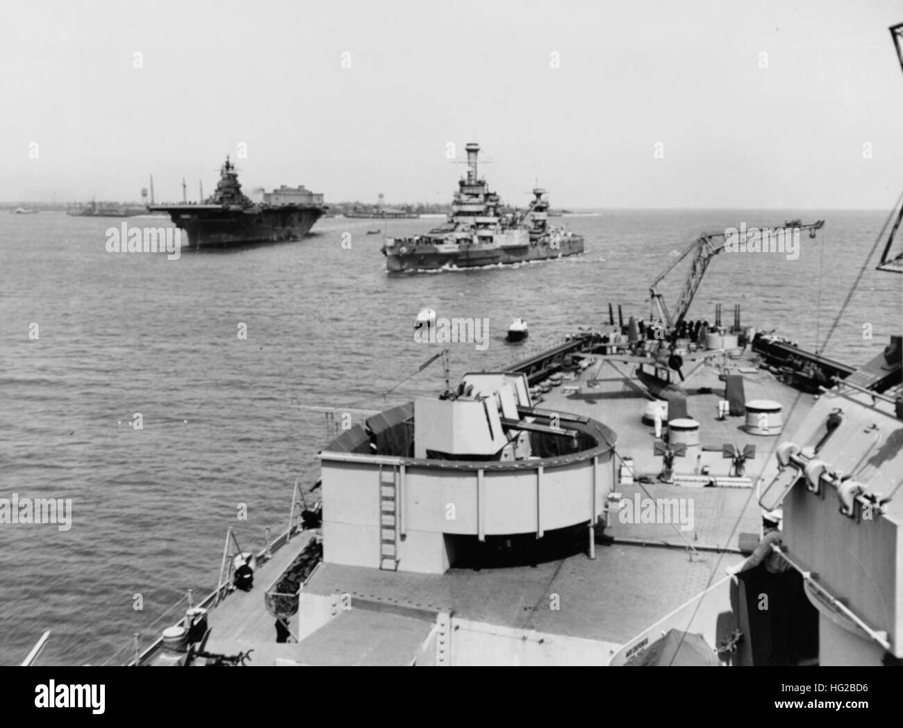 USS Wyoming (AG-17) and USS Lexington (CV-16) in port on 13 May 1943 Stock Photo