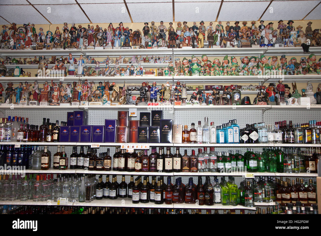 Liquor store with upper shelves filled with collector alcohol bottles