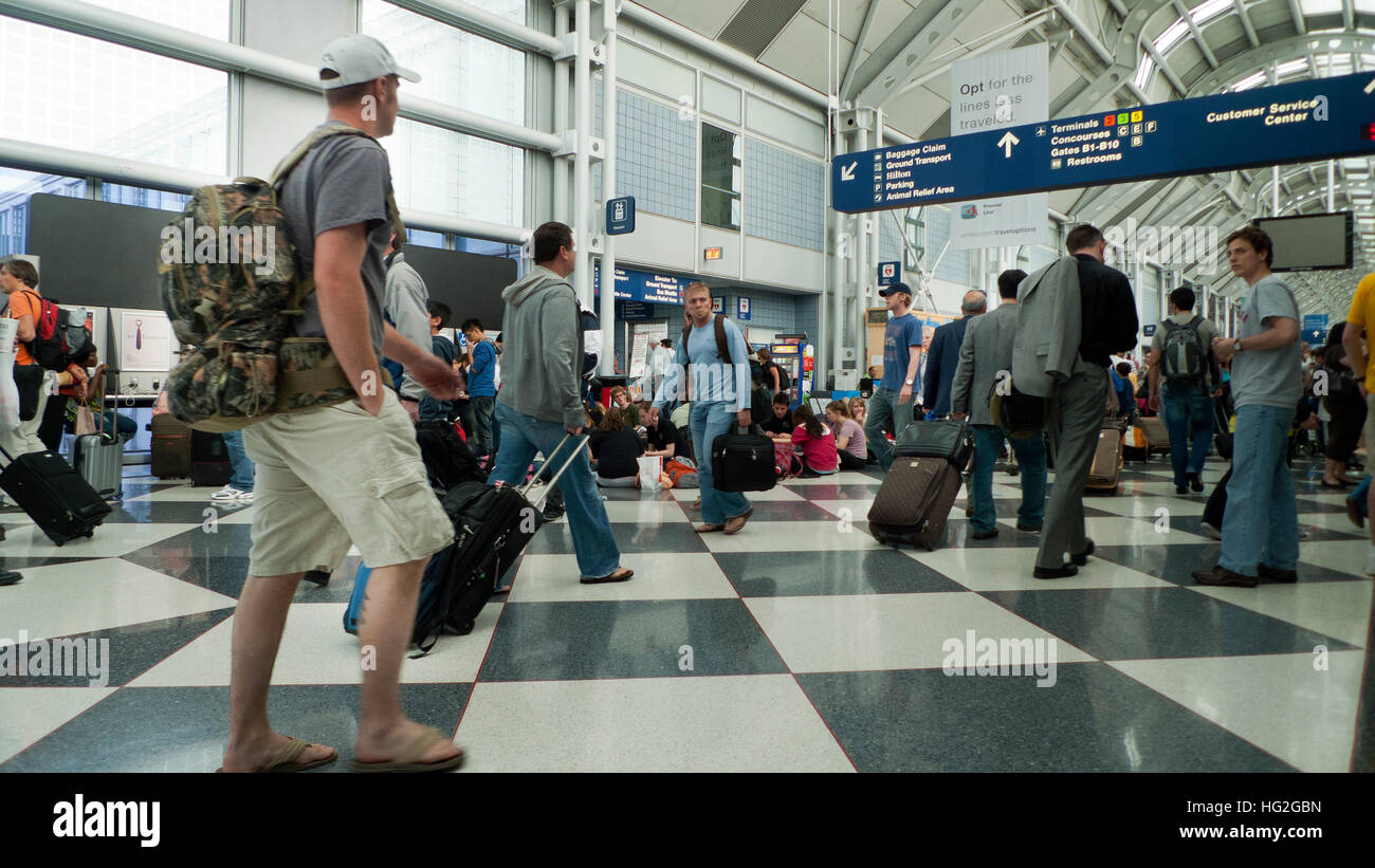 Passengers United Airlines terminal OHare airport Chicago Illinois USA Stock Photo