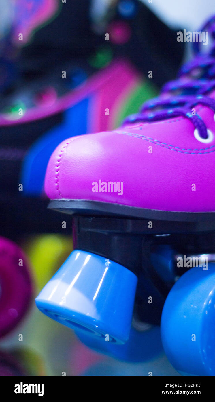 Quad skate rollerskates in skate store in shop window display. Skates