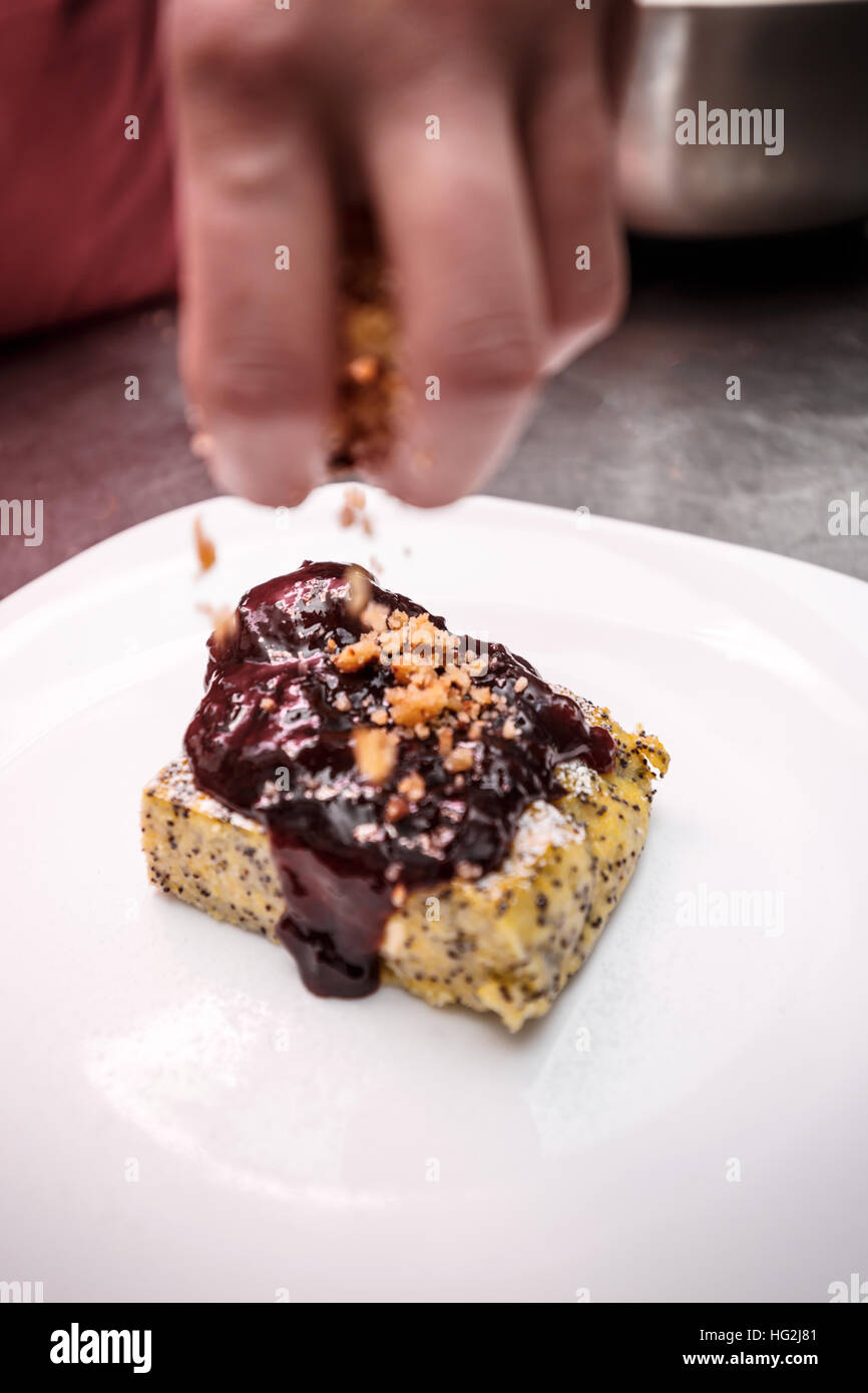 Polenta cake with poppy seeds and plum jam Stock Photo Alamy