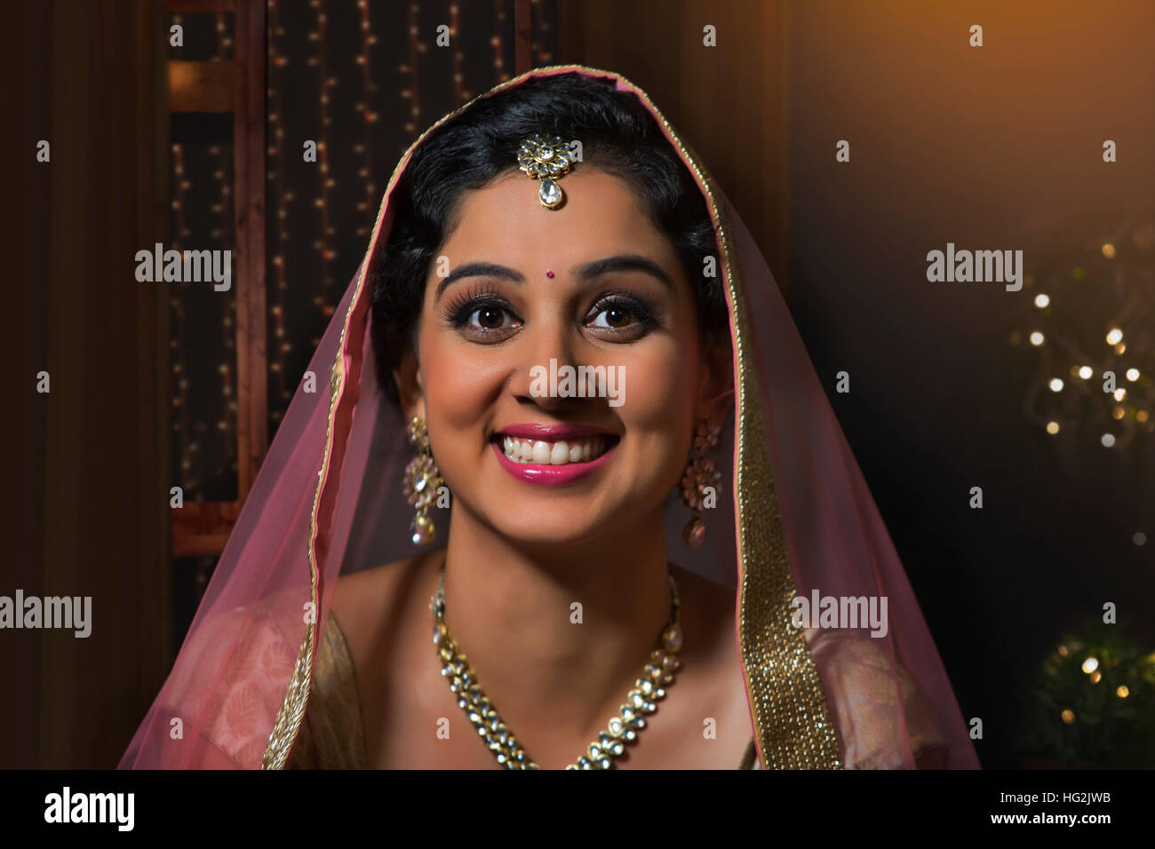 Close-up portrait of young woman in traditional dress and jewelry Stock ...