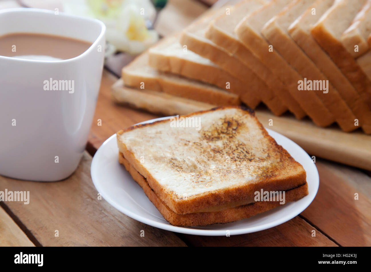 Toasted white bread with cup of tea Stock Photo Alamy