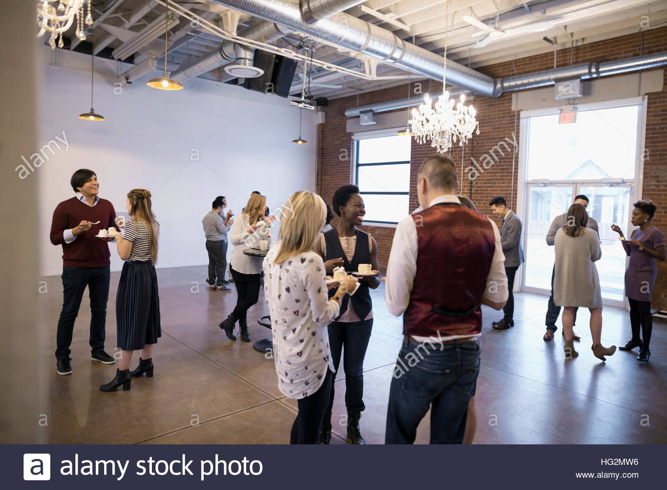 Business people networking at conference Stock Photo