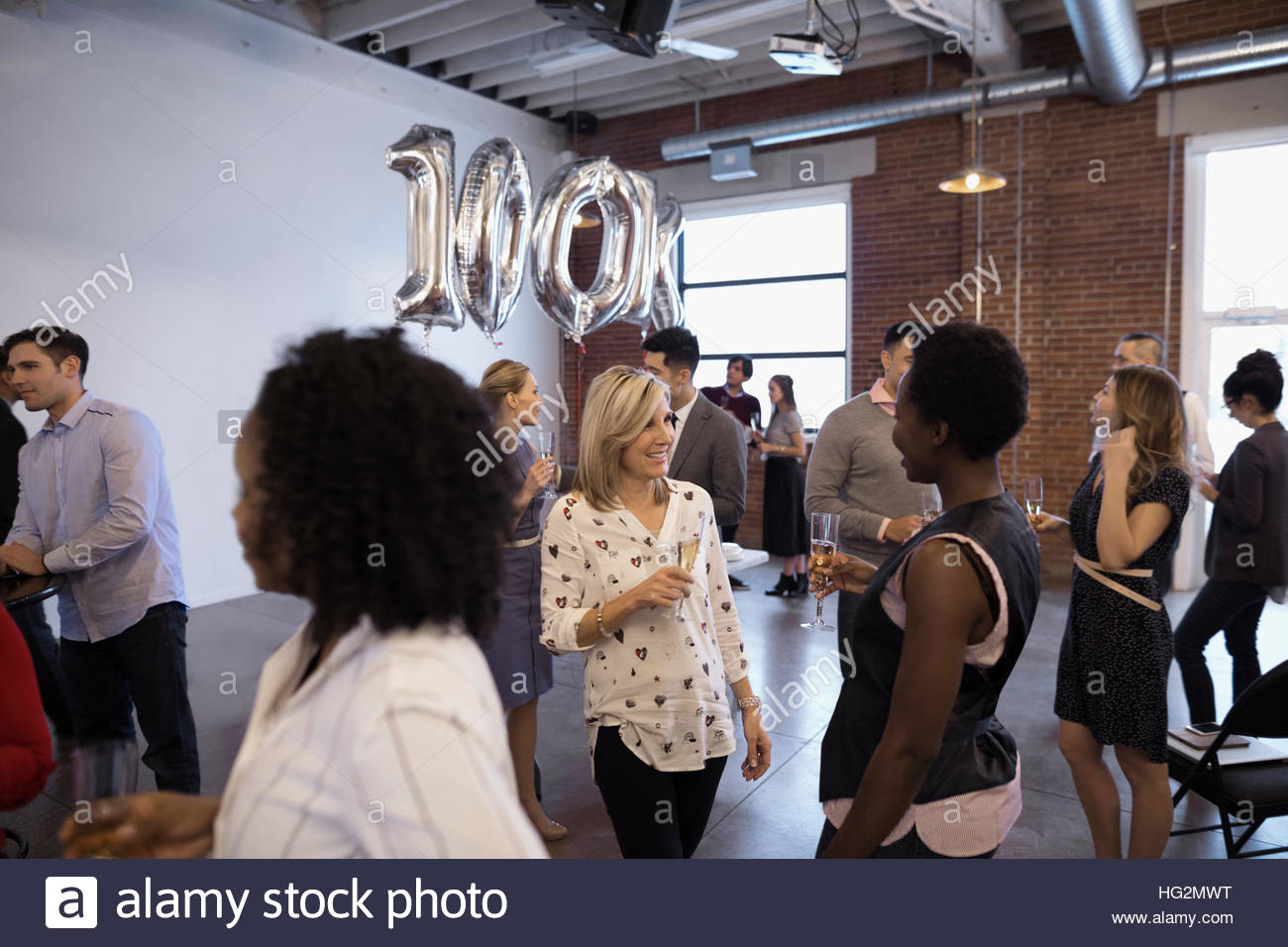 Business people networking and celebrating milestone Stock Photo