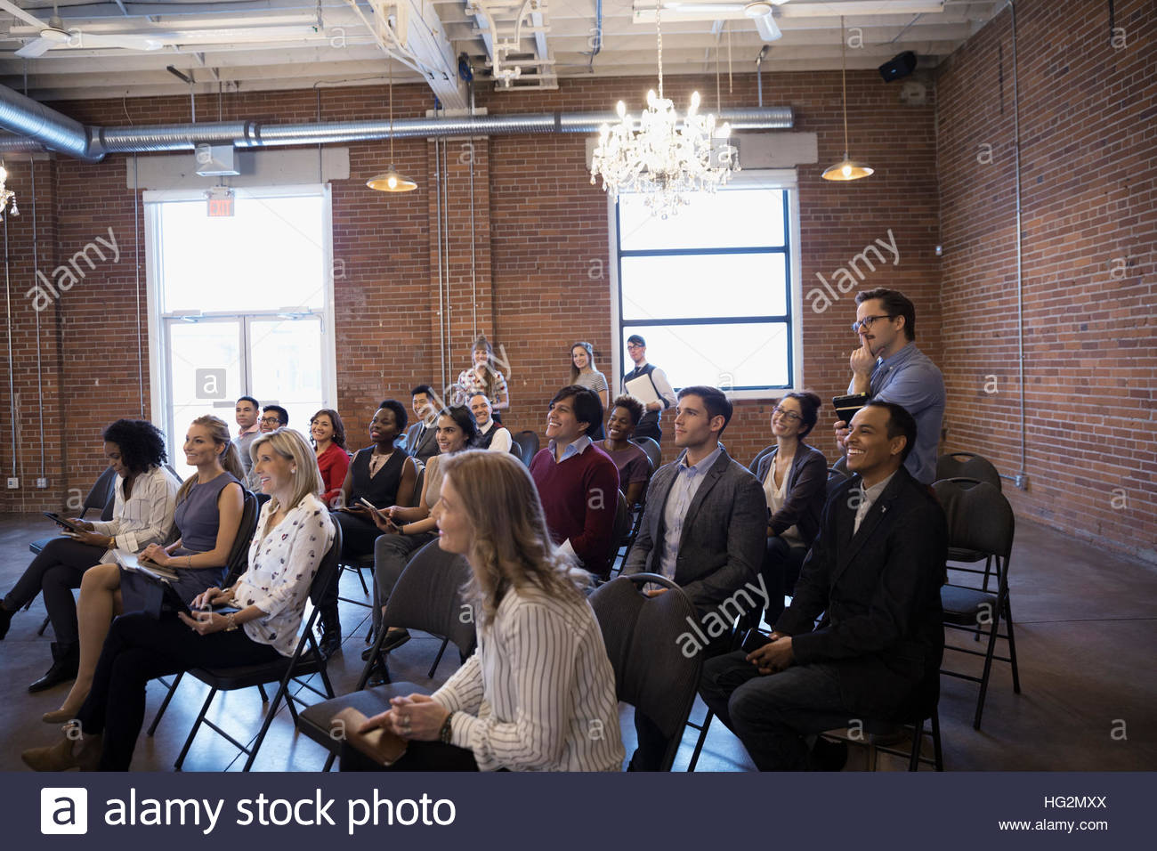 Business people in conference room audience Stock Photo