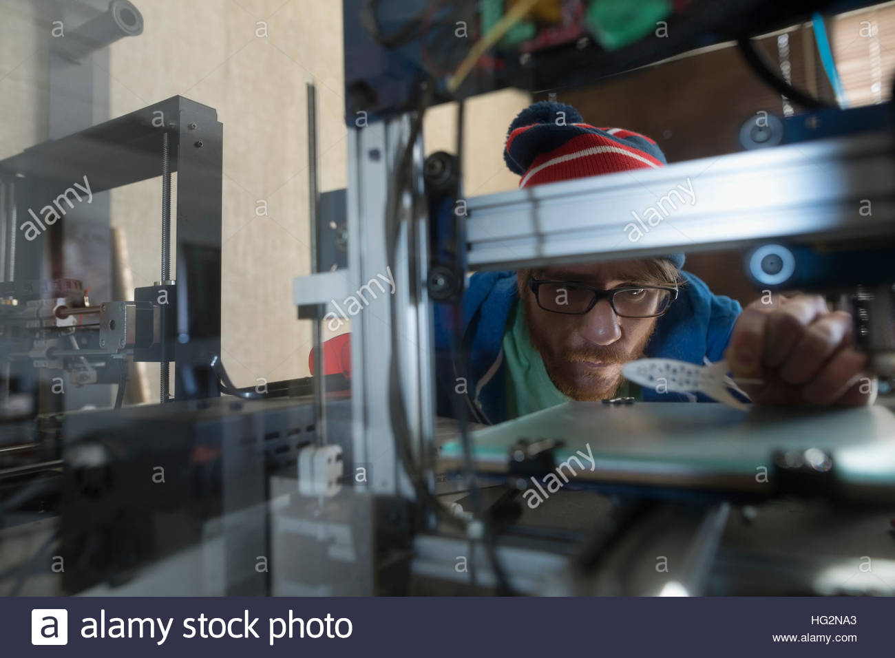 Male engineer using 3D printer in Stock Photo Alamy