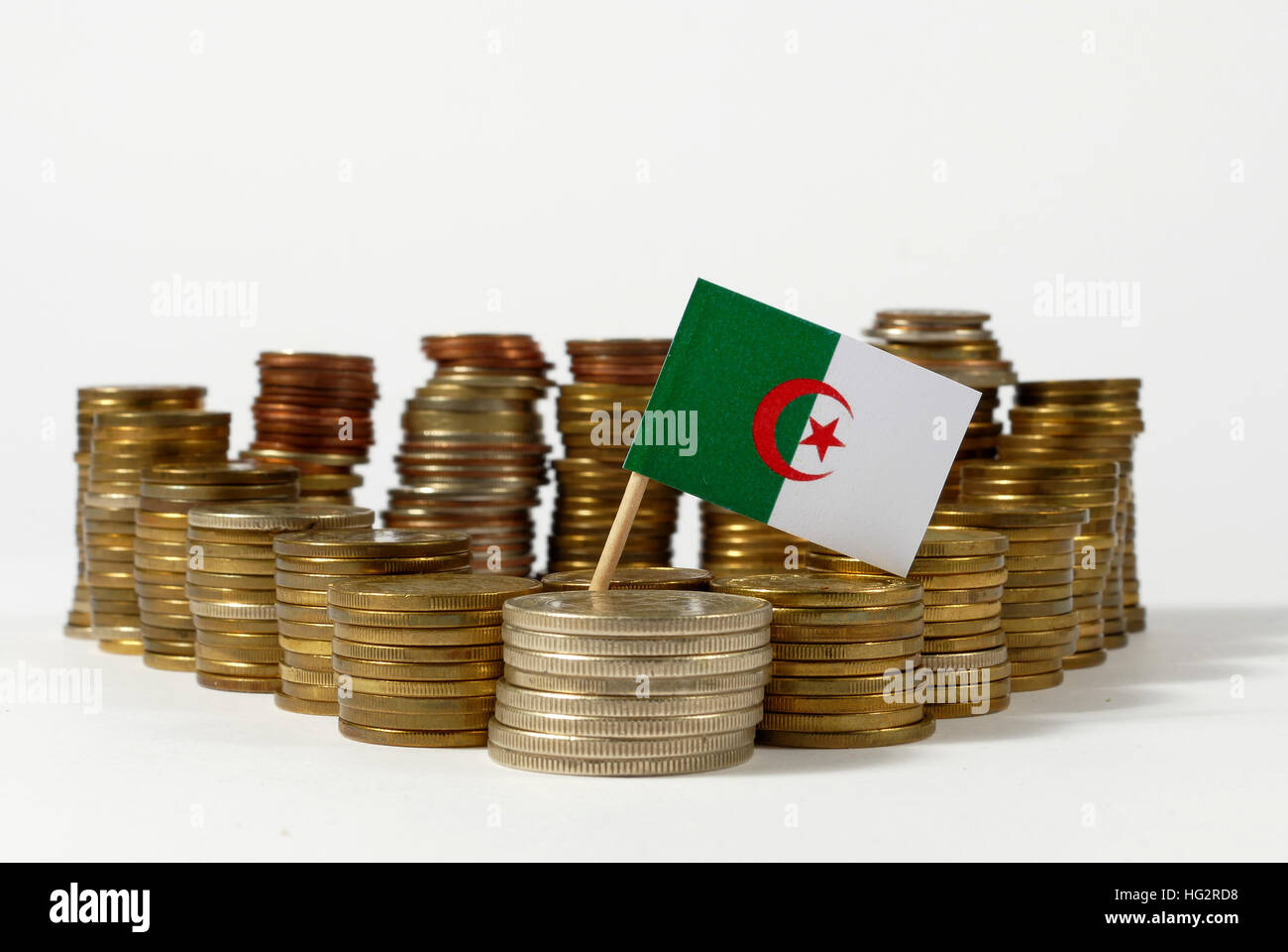 Algeria flag waving with stack of money coins Stock Photo