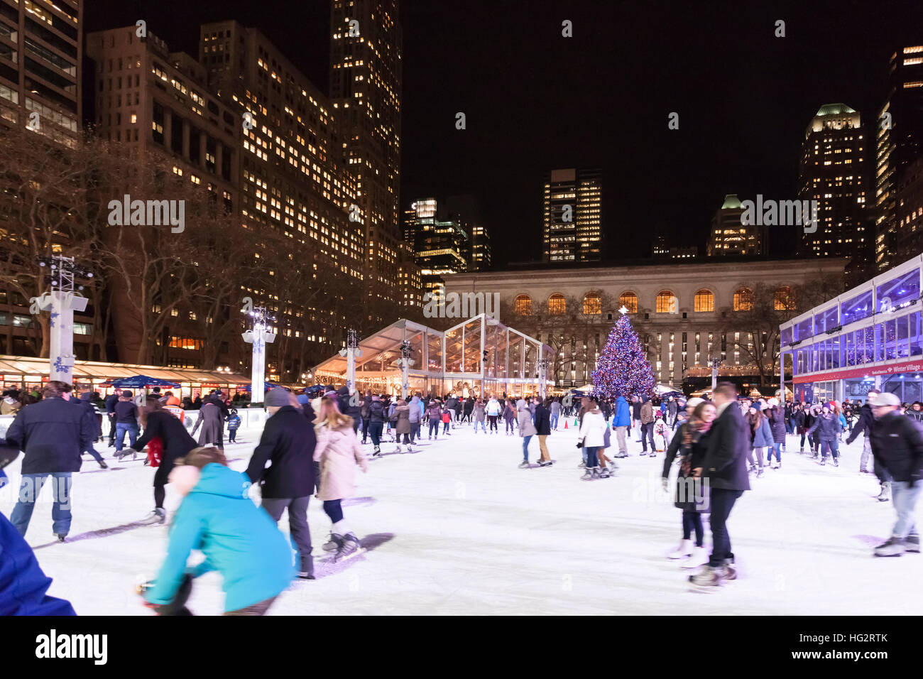 Ice skating in Bryant Park, New York. Stock Photo