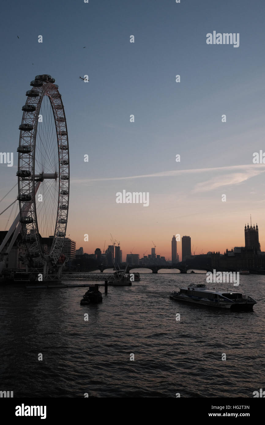 London Eye and London cityscape with a sunset glow Stock Photo