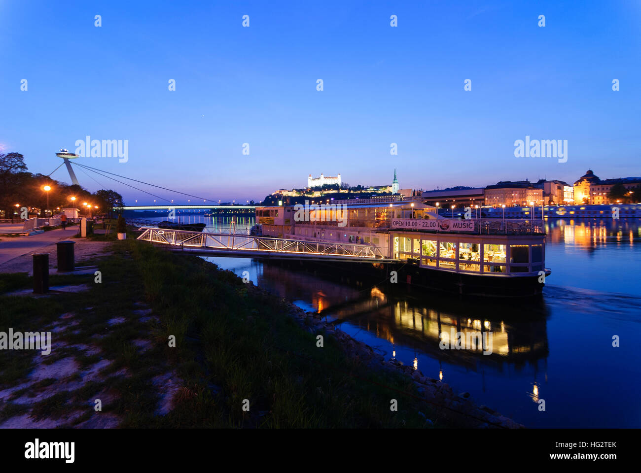 Bratislava (Pressburg): Danube with the New Bridge, the Pressburg castle and the St. Martin's Cathedral (from left to right), restaurant ship, , , Slo Stock Photo