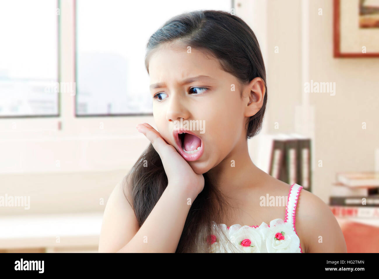 Portrait of girl with toothache Stock Photo