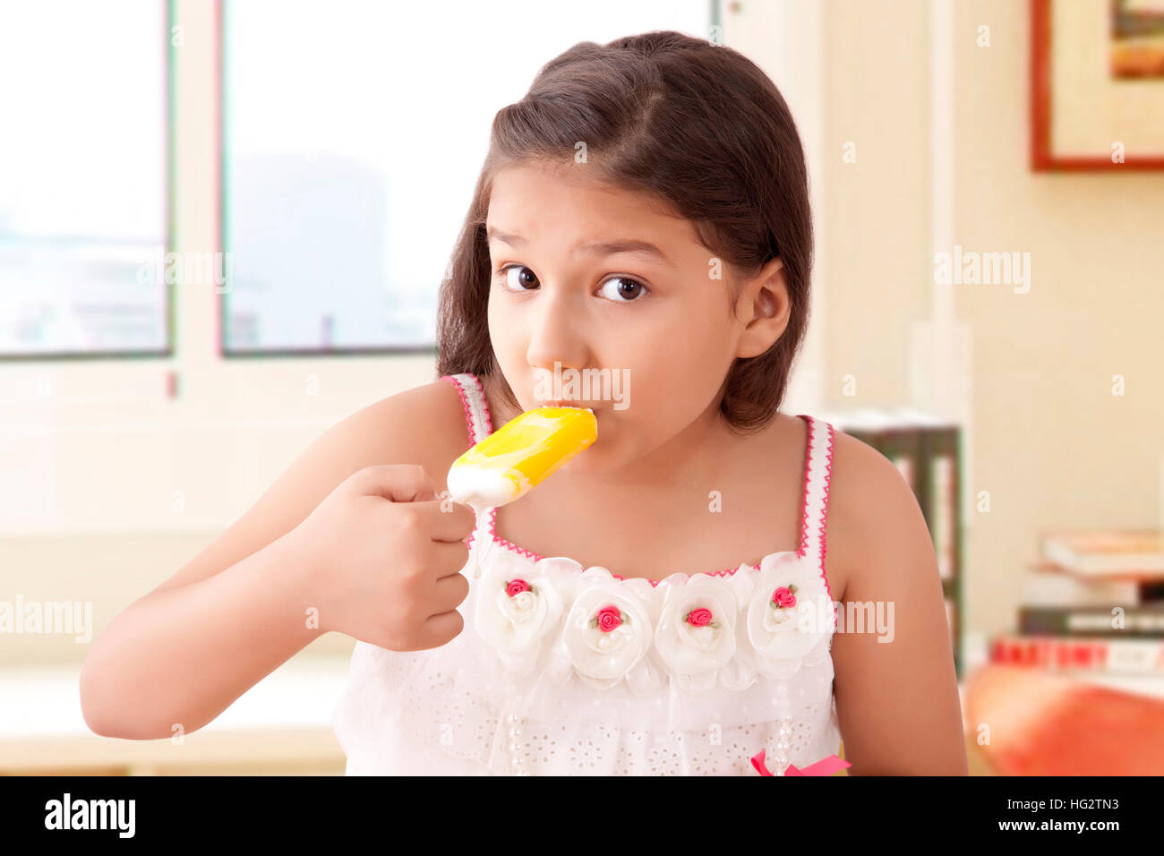 Child ice lolly eating hires stock photography and images Alamy