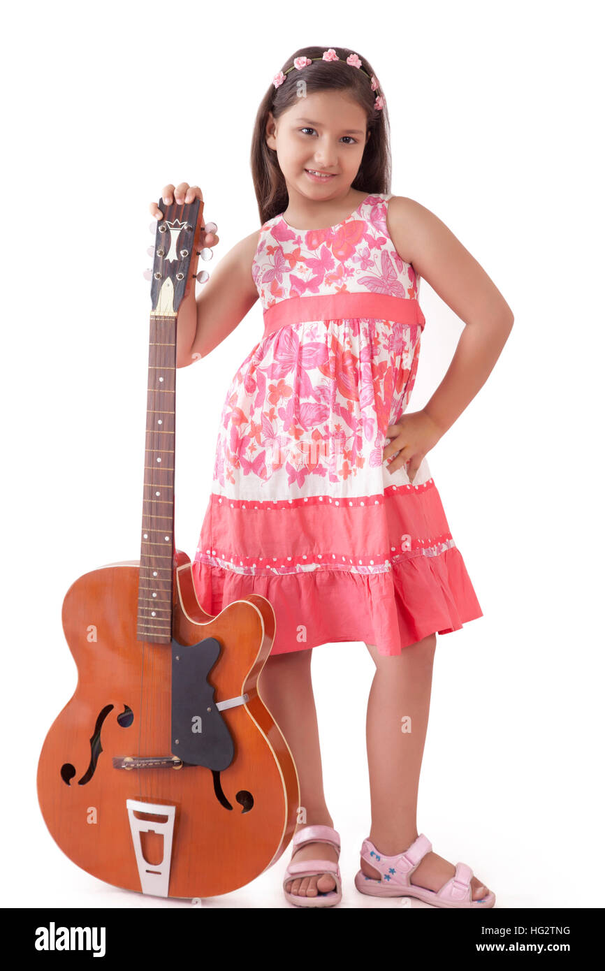 Young girl holding guitar Stock Photo - Alamy