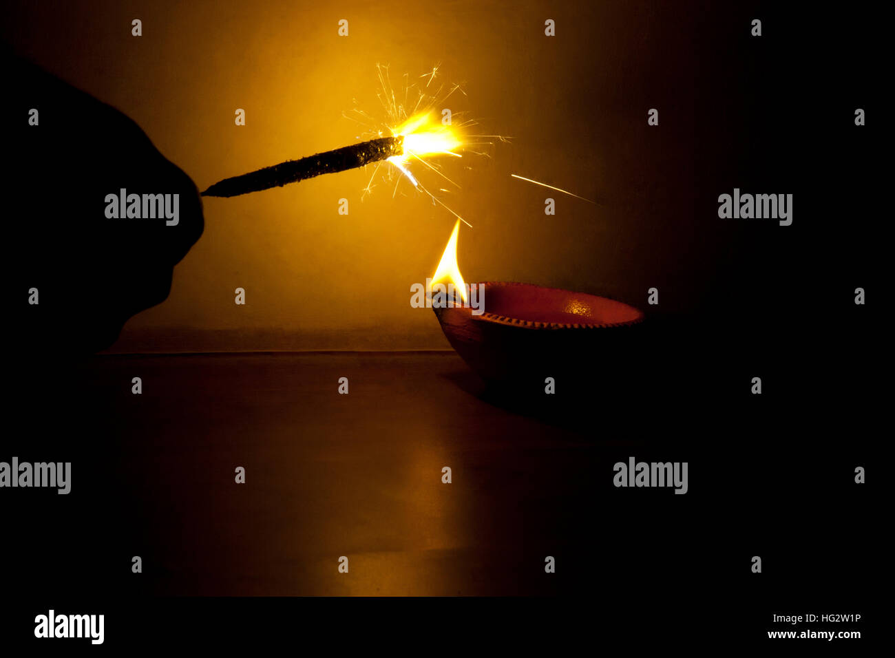 Person burning crackers on Diwali Stock Photo