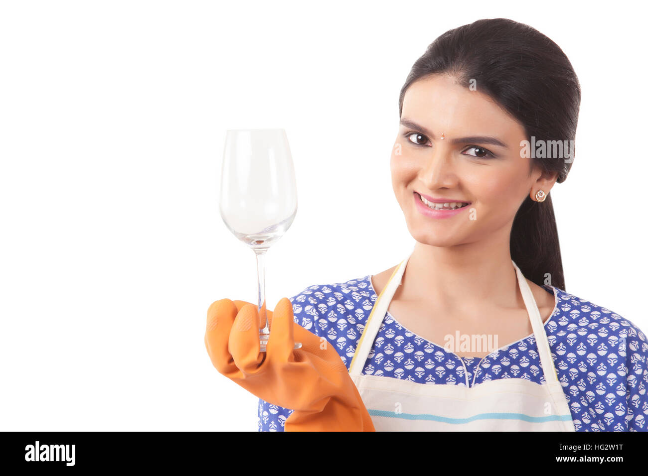 Young Woman Cleaning Wine Glass Stock Photo