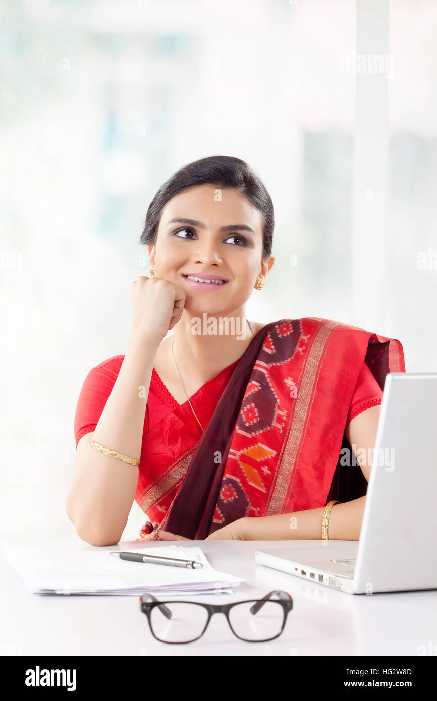 Indian woman working in the office Stock Photo Alamy