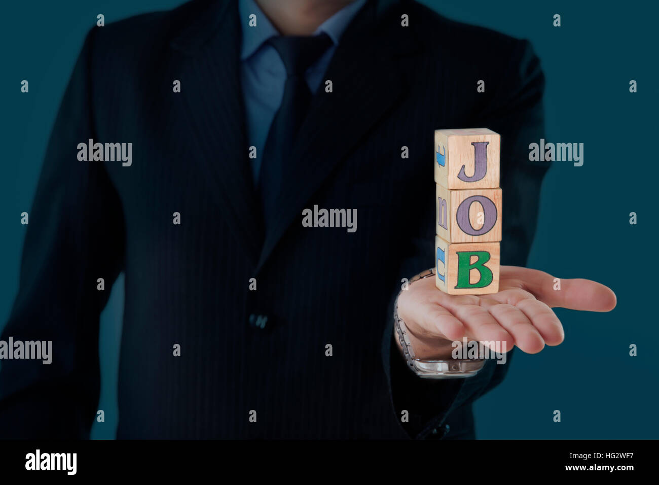 Businessman holding the job sign Stock Photo