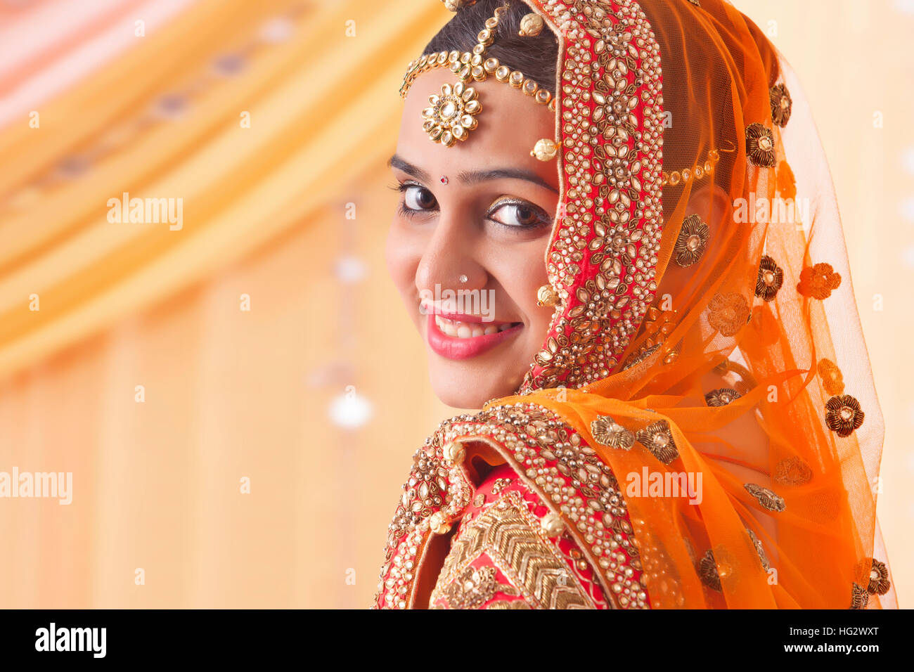 beautiful bride looking at camera , indian Bride Stock Photo