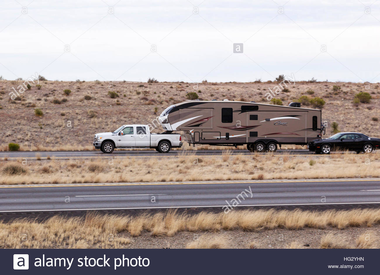 Pickup truck pulling large travel trailer in southeastern Arizona 3