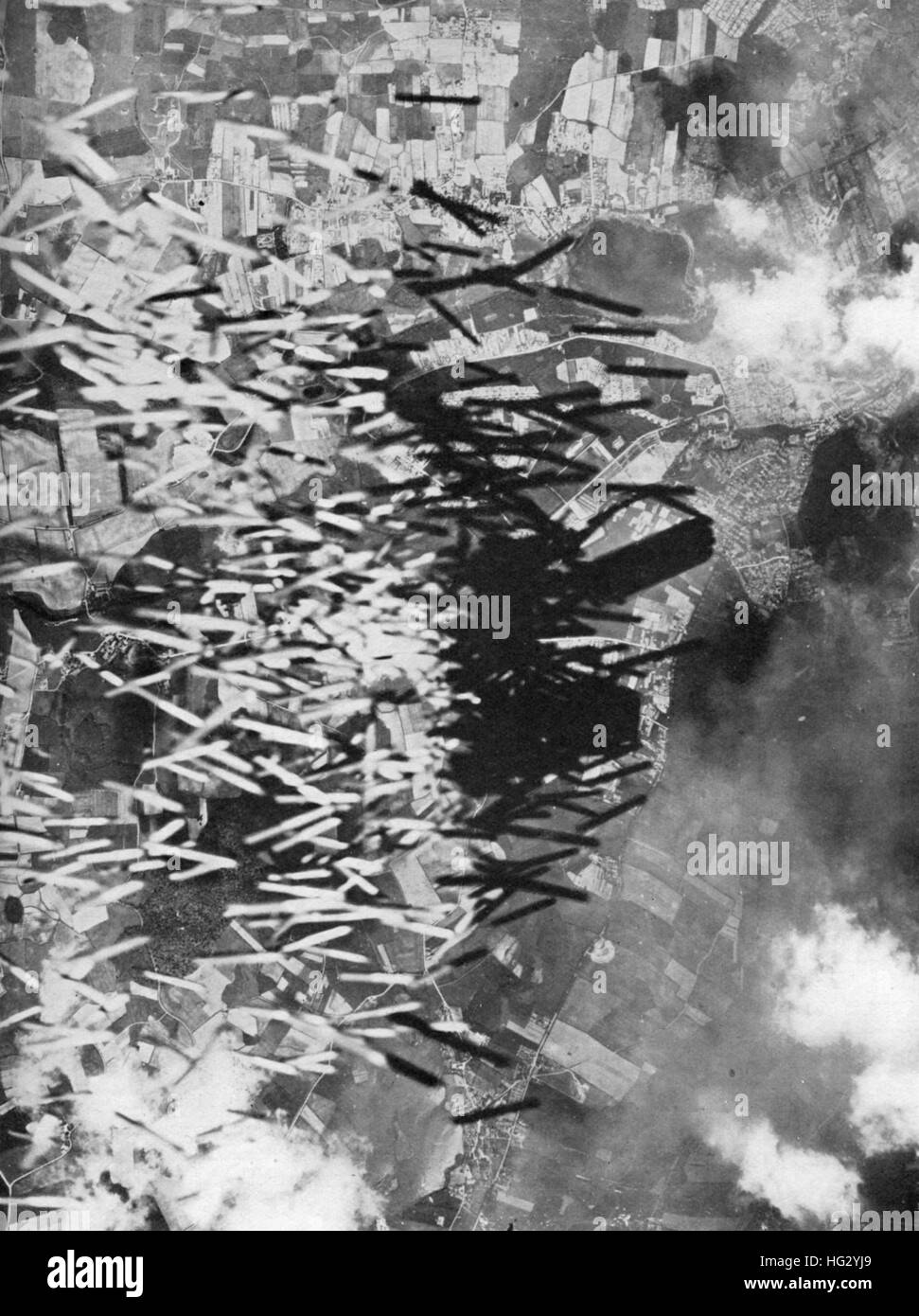 KEIL BOMBING RAID 14 MAY 1943.  USAAF B-24 bombers dropping 100lb cluster incendiaries intended to set fire to the rubble caused by earlier bombs dropped by B-17s. The primary target was the Krupp Submarine works. Stock Photo
