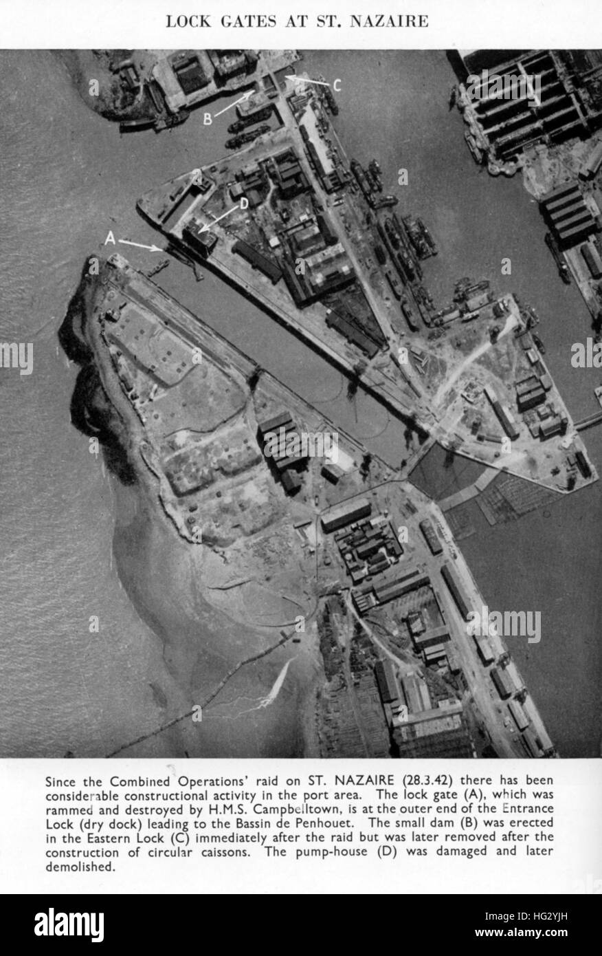 ST NAZAIRE, France.  RAF reconnaissance photo in the Air Ministry magazine Evidence in Camera of April 1942 showing  repairs underway to  the lock gates following the Combined Operations raid on 28 March. Stock Photo