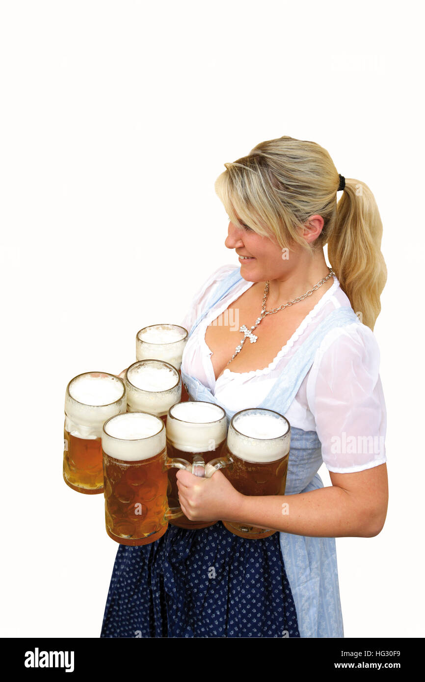 Bavarian waitress wearing dirndl holding beer steins (beer mugs Stock ...