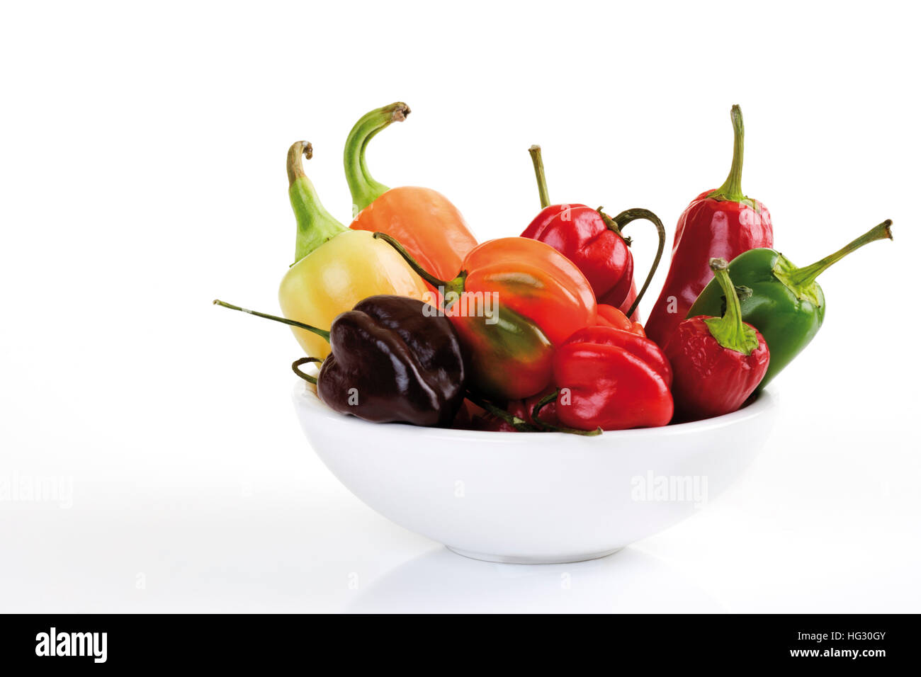 Assorted chili peppers - Habanero, Fresno, Thai Chili, Santa Fe, Scotch Bonnet and Jalapeno Stock Photo