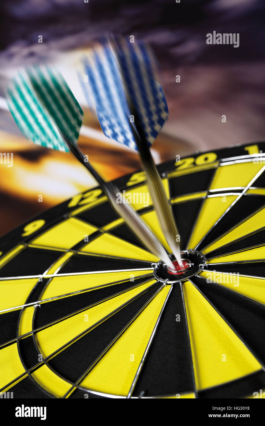 Darts in a bullseye Stock Photo Alamy