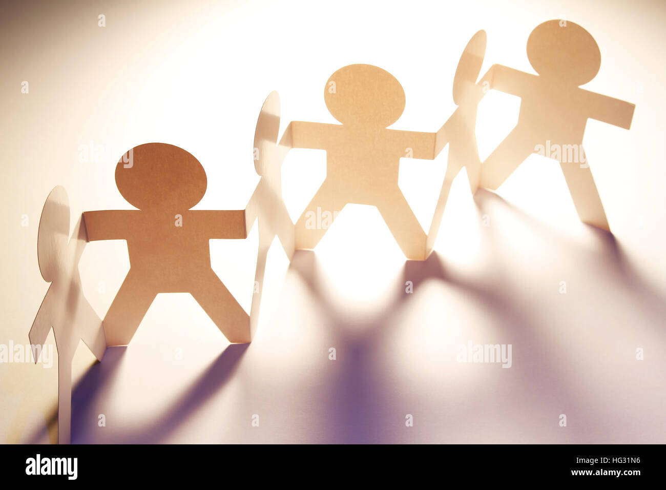 Team 2 Paper Team of paper doll people Stock Photo - Alamy