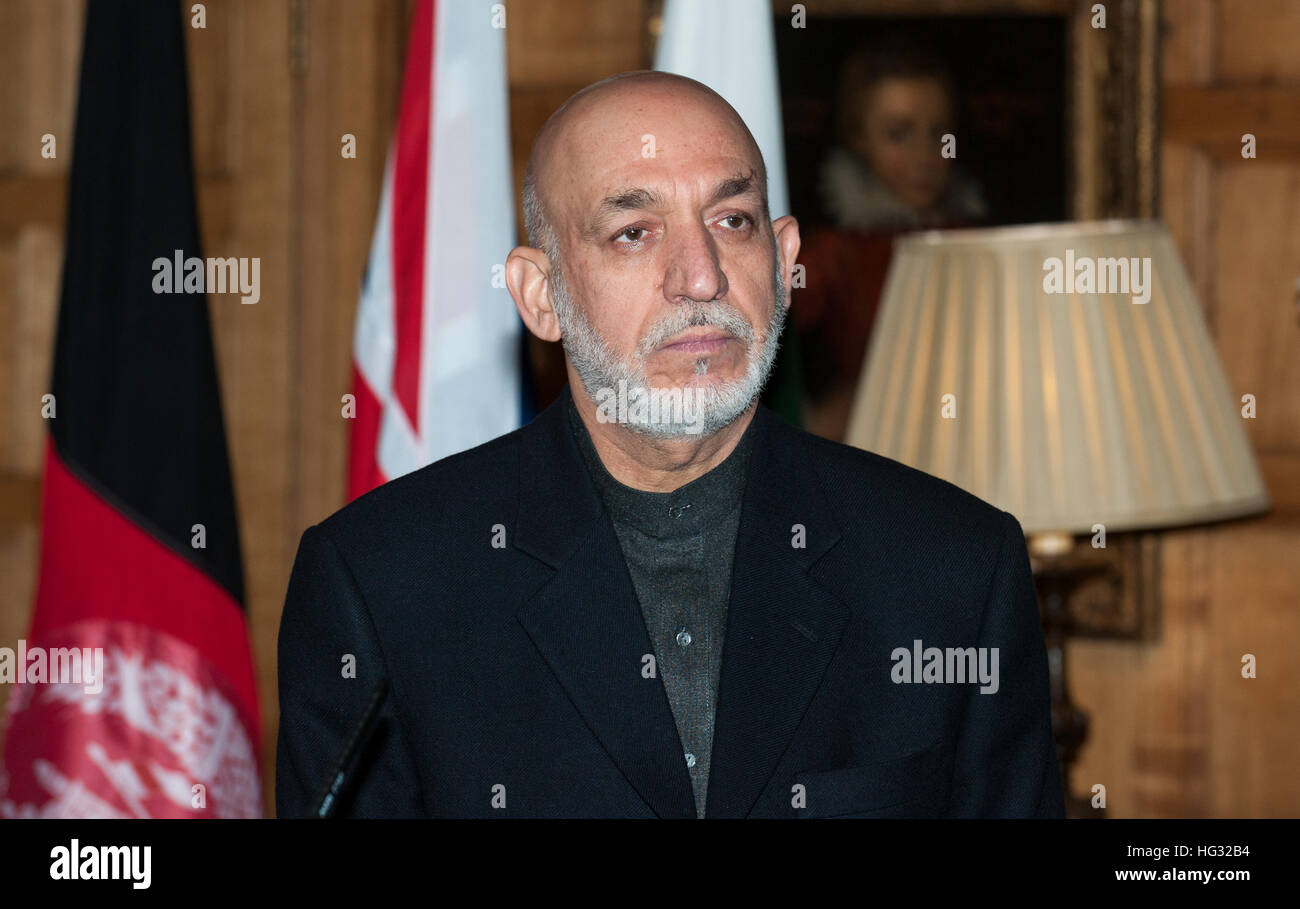 President Hamid Karzai of Afghanistan speaking following a trilateral meeting , with Prime minister David Cameron and President Asif Ali Zardari of Pakistan at the P.M.'s country home of Chequers. Stock Photo