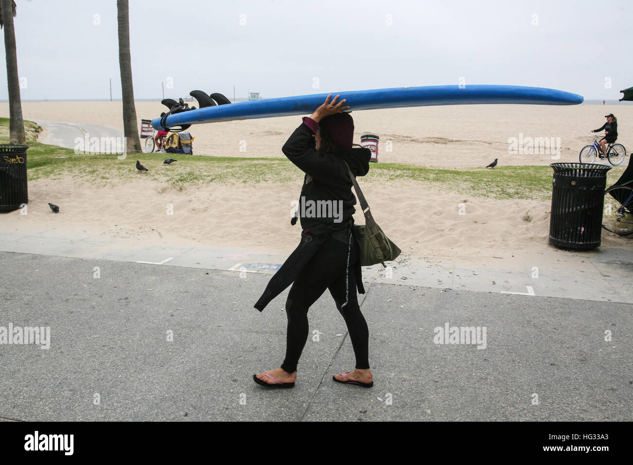 surfer,woman,carrying,carry,surfboard,on,her,head,At, Venice Beach,Santa Monica,Los Angeles,L.A.,California,U.S.A.,United States of America, Stock Photo