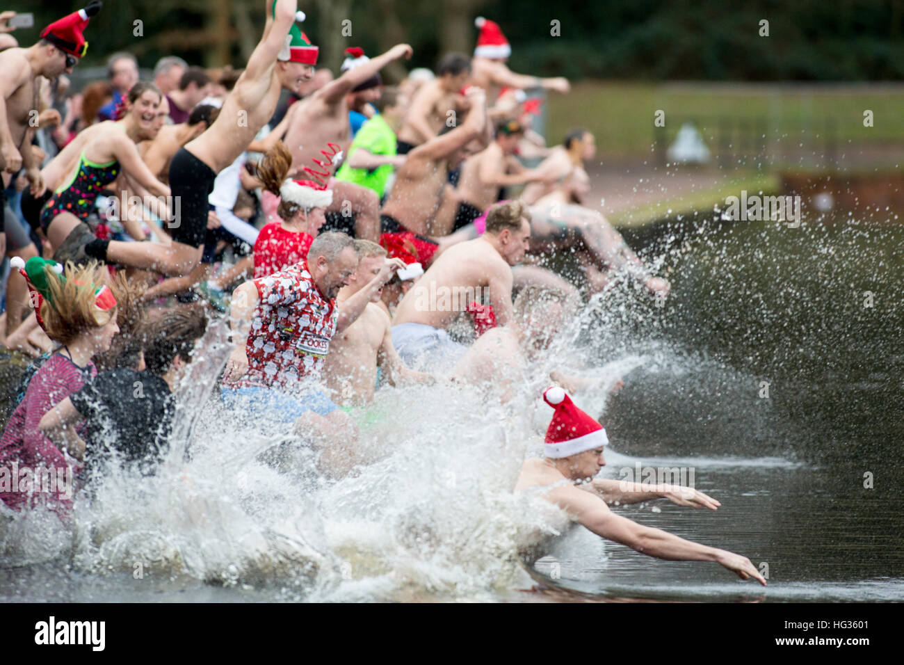 The Christmas day swim at Black Root Pool, Sutton Coldfield park, West