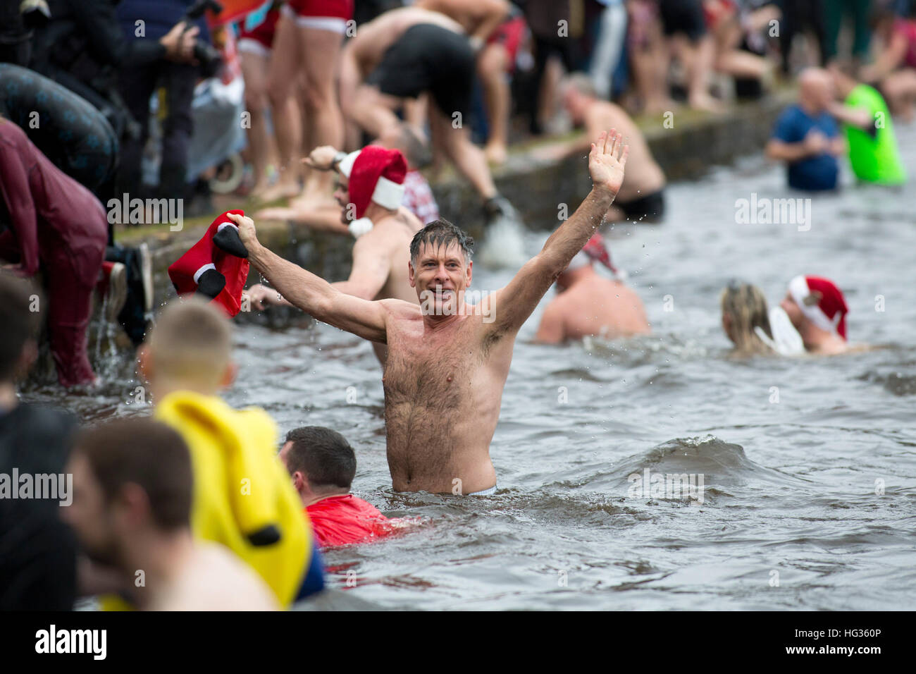 The Christmas day swim at Black Root Pool, Sutton Coldfield park, West Midlands Stock Photo