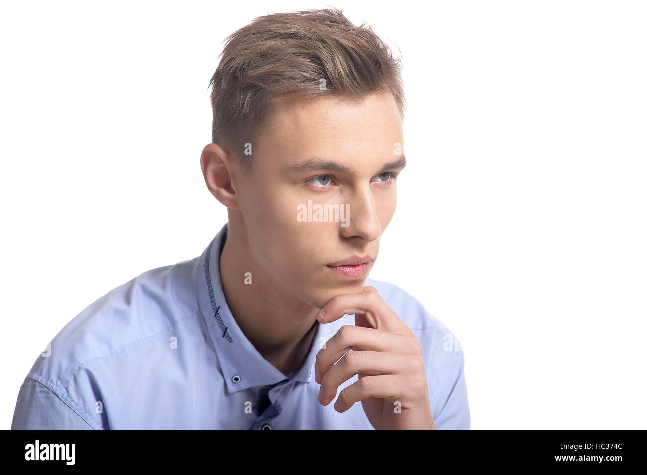 Pensive young man Stock Photo - Alamy