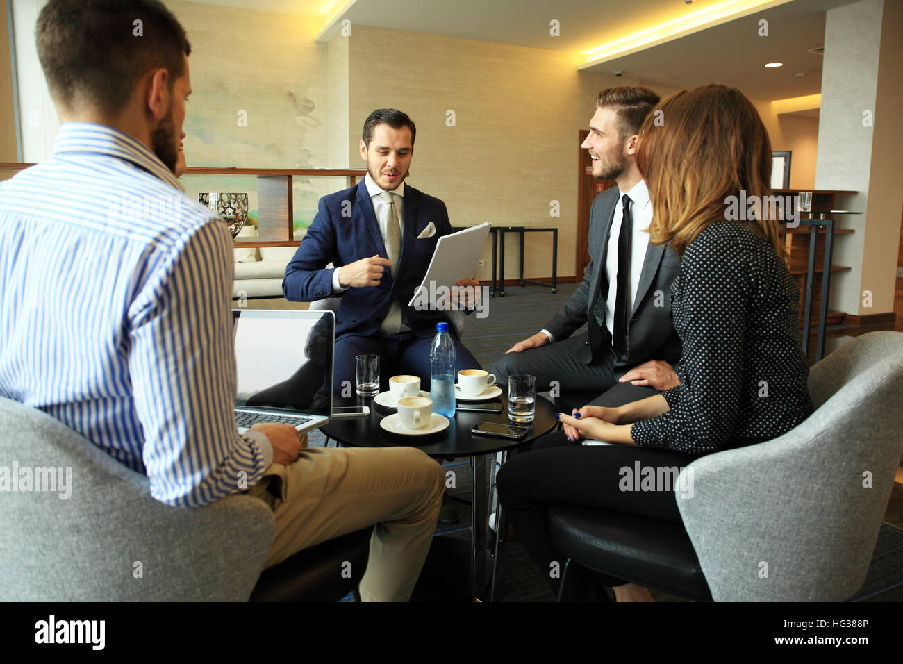 Young professionals work in modern office.Business crew working with startup. Stock Photo