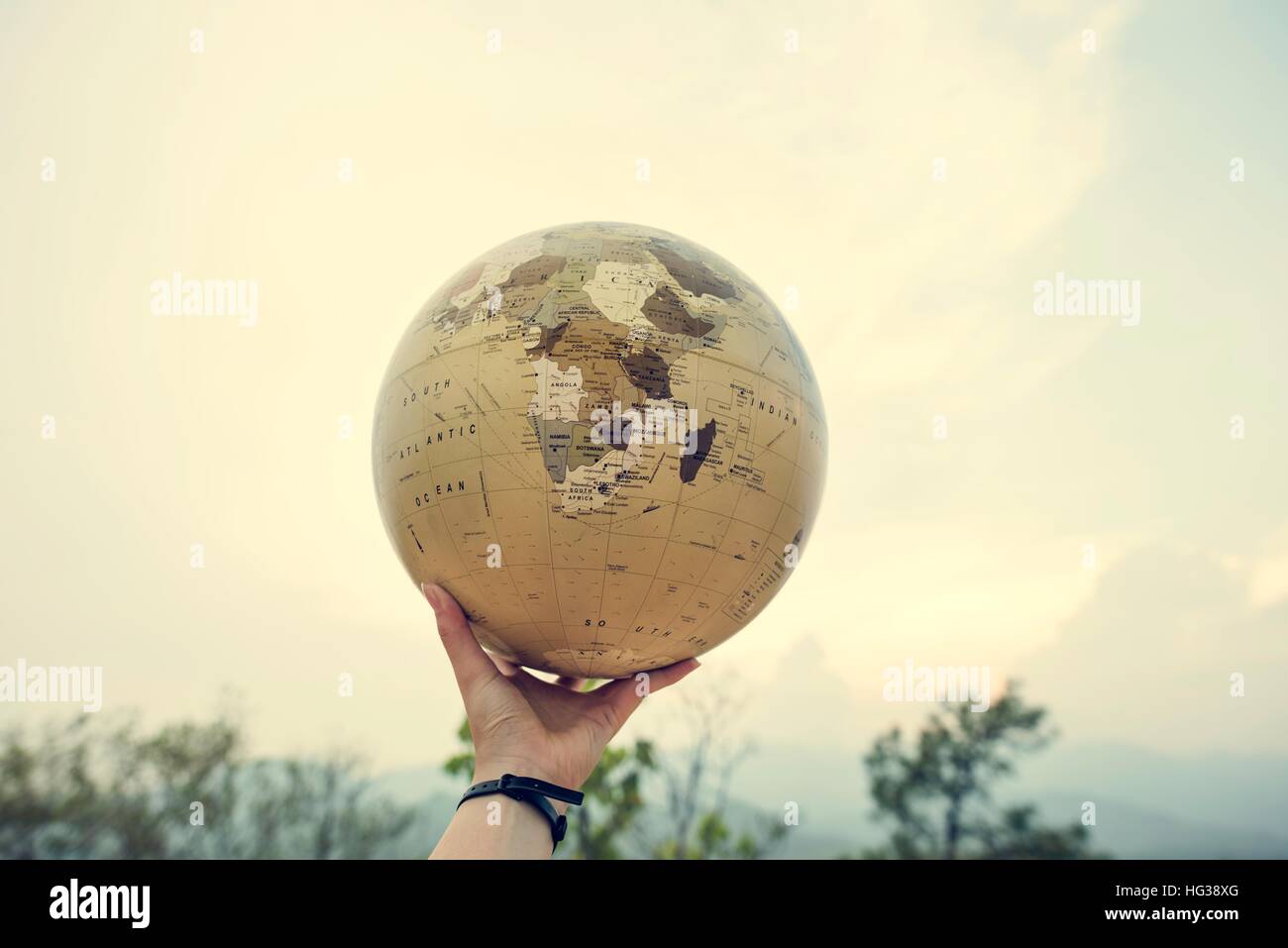 Hand Holding Globe World Location Concept Stock Photo